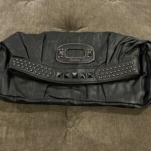 Marciano clutch with snap fold closure